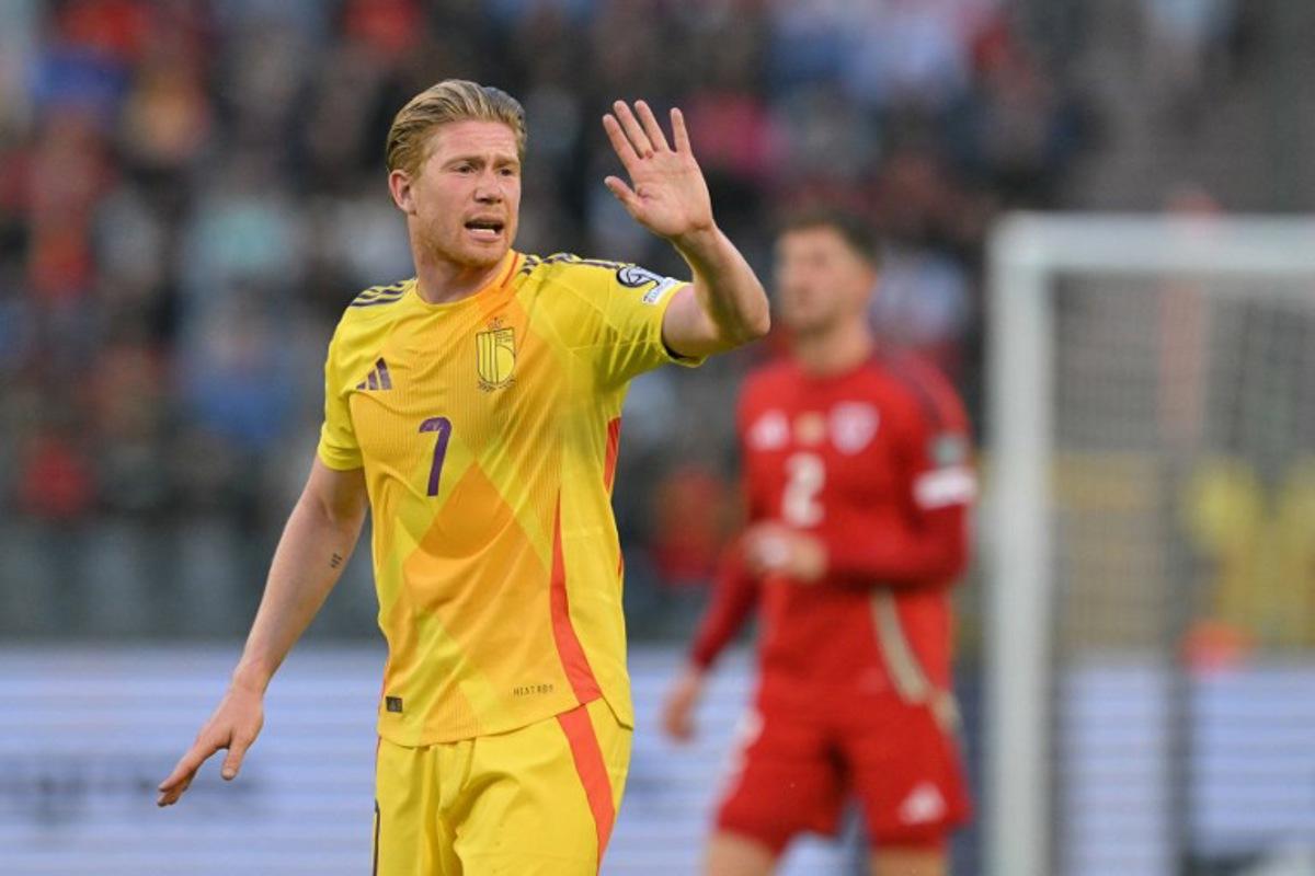 Belgium's midfielder #07 Kevin De Bruyne (L) gestures during the FIFA World Cup 2026 Group J European qualification football match between Belgium and Wales at the King Baudouin Stadium in Brussels, on June 9, 2025.  NICOLAS TUCAT / AFP