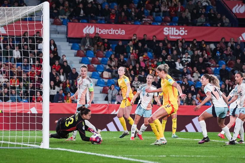 Spain's goalkeeper Catalina Coll and Belgium's Justine Vanhaevermaet pictured in action during a soccer game between Belgium's national team the Red Flames and Spain, in Valencia, Spain Friday 21 February 2025, on the first matchday in group A3 of the 2024-25 Women's Nations League Competition. BELGA PHOTO JOMA GARCIA I GISBERT
