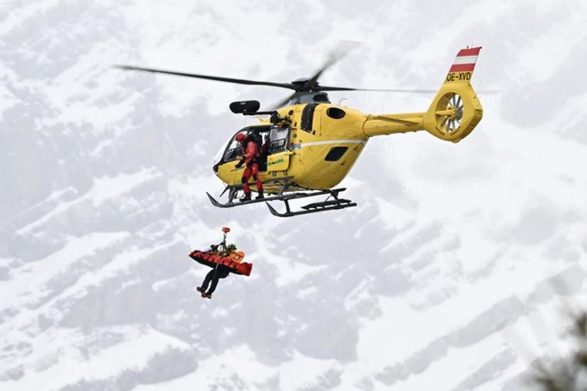 Norway's Fredrik Moeller is airlifted off the slope after crashing in the first official training for the men's downhill alpine skiing event ahead of the Milano Cortina 2026 Winter Olympic Games at the Stelvio Ski Centre in Bormio (Valtellina) on February 4, 2026.  Fabrice COFFRINI / AFP