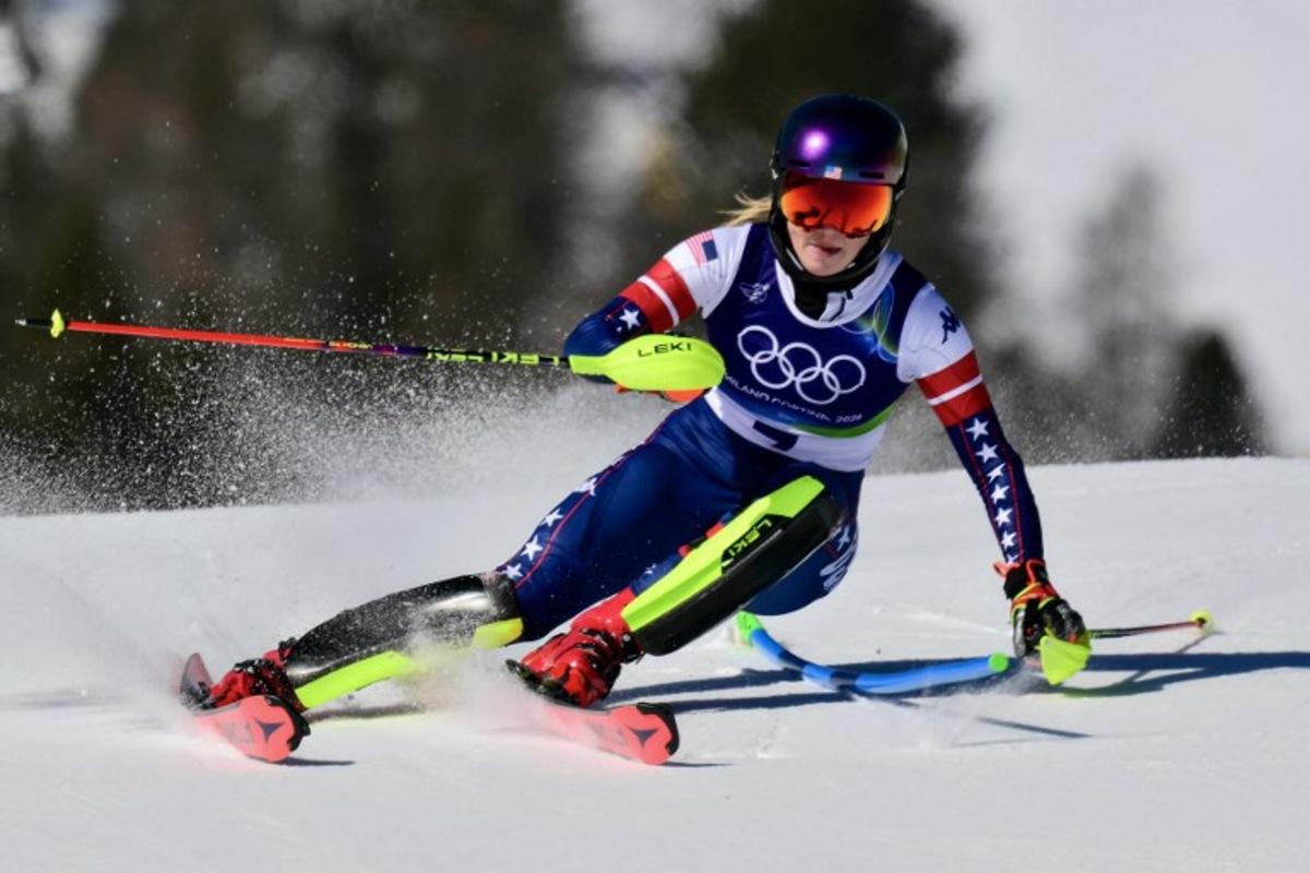 USA's Mikaela Shiffrin competes in the first run of the women's slalom event during the Milano Cortina 2026 Winter Olympic Games at the Tofane Alpine Skiing Centre in Cortina d'Ampezzo on February 18, 2026.  Stefano RELLANDINI / AFP