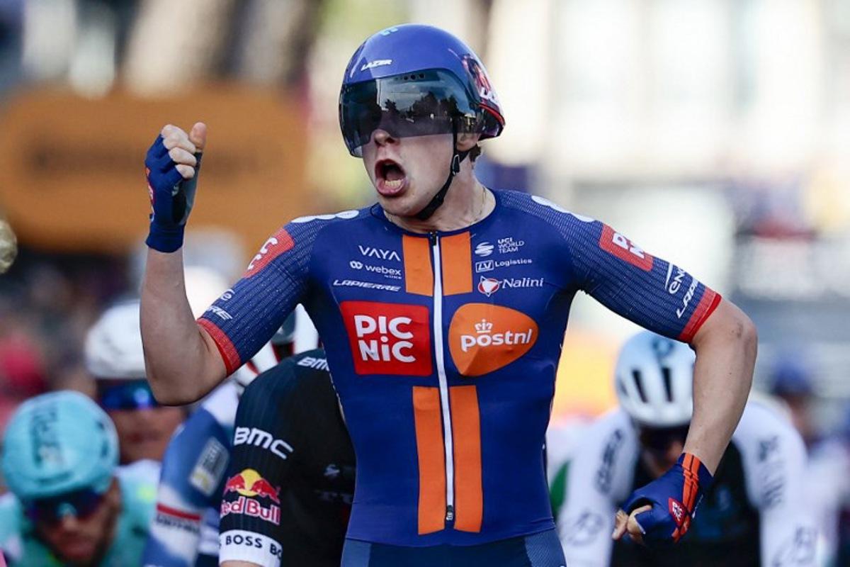Team Picnic PostNL's Dutch rider Casper Van Uden celebrates as he crosses the finish line of the 4th stage of the 108th Giro d'Italia cycling race 189kms from Alberobello to Lecce on May 13, 2025  Luca Bettini / AFP