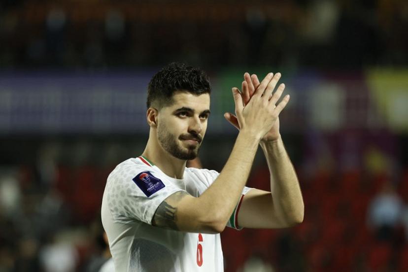 Iran's midfielder #06 Saeid Ezatolahi applauds the fans at the end of the Qatar 2023 AFC Asian Cup football match between Iran and Syria at the Abdullah bin Khalifa Stadium in Doha on January 31, 2024.  KARIM JAAFAR / AFP