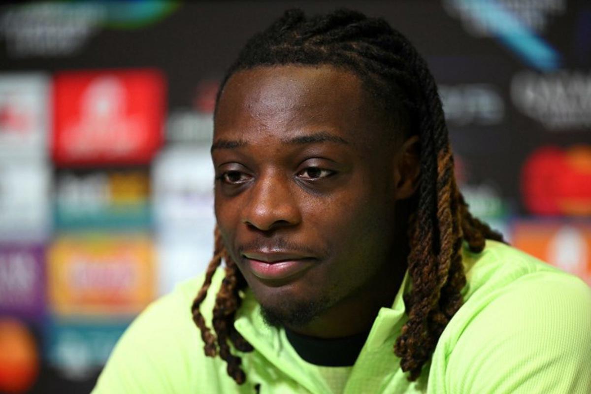 Manchester City's Belgian midfielder #11 Jeremy Doku attends a press conference at the Etihad Campus training ground in Manchester, north-west England, on January 27, 2026, on the eve of their UEFA Champions League, league stage football match against Galatasaray.  Oli SCARFF / AFP