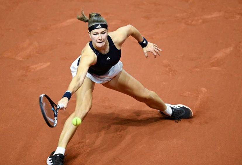 Czech Republic's Karolina Muchova returns the ball to Ukraine's Elina Svitolina (unseen) during their semi-final match of the 2026 WTA Stuttgart Open Tennis Tournament on April 18, 2026 in Stuttgart, south-western Germany.  THOMAS KIENZLE / AFP