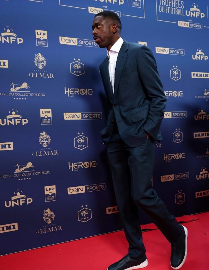 Paris Saint-Germain's French forward #10 Ousmane Dembele arrives to attend the 33th edition of the UNFP (French National Professional Football players Union) awards ceremony, in Paris on May 11, 2025.  FRANCK FIFE / AFP