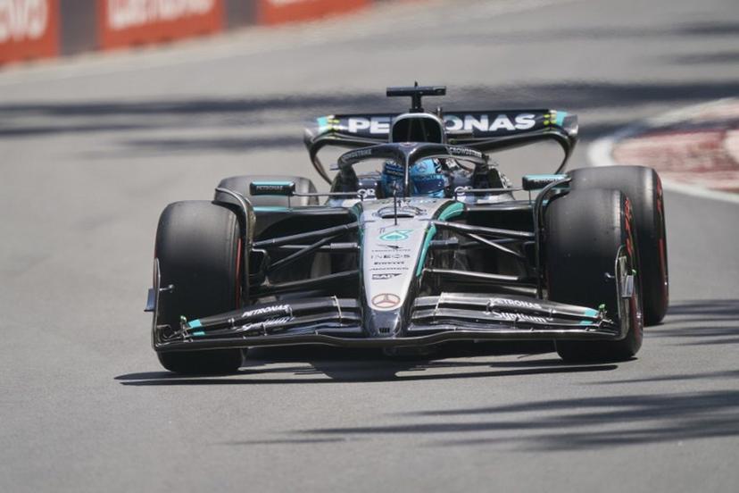 Mercedes' British driver George Russell races during the third practice session for the 2025 Formula 1 Grand Prix du Canada at Circuit Gilles-Villeneuve in Montreal, Canada, on June 14, 2025.   Geoff Robins / AFP