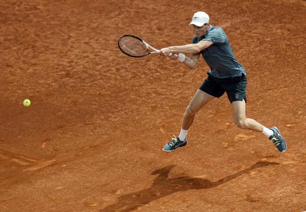 Italy's Jannik Sinner returns a ball to Spain's Rafael Jodar during their 2026 ATP Tour Madrid Open tennis tournament quarterfinal singles match at the Caja Magica in Madrid, on April 29, 2026.  OSCAR DEL POZO / AFP