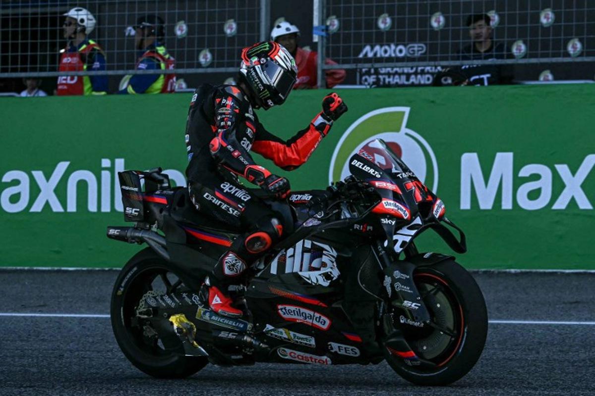 Aprilia Racing's Italian rider Marco Bezzecchi celebrates his victory after crossing the finish line during the MotoGP Thailand Grand Prix at the Buriram International Circuit in Buriram on March 1, 2026.  Lillian SUWANRUMPHA / AFP