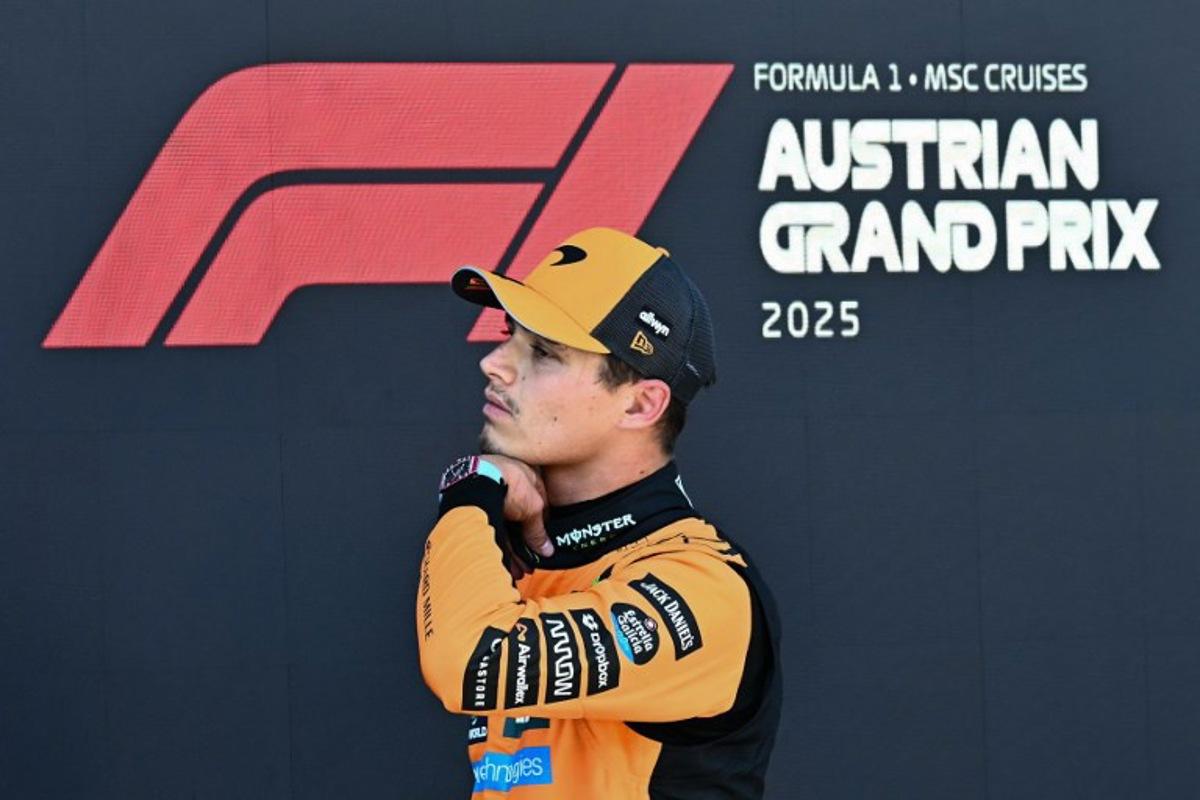 Pole position winner McLaren's British driver Lando Norris arrives for the ceremony after the qualifying session at the Red Bull Ring race track in Spielberg, Austria, on June 28, 2025, ahead of the Formula One Austrian Grand Prix.   Joe Klamar / AFP