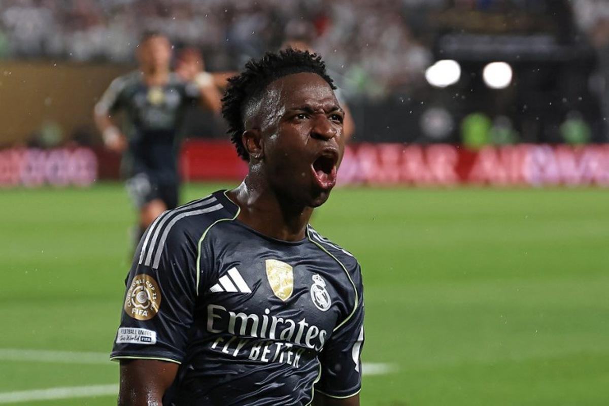 Real Madrid's Brazilian forward #07 Vinicius Junior celebrates scoring his team's first goal during the FIFA Club World Cup 2025 Group H football match between Austria's FC Salzburg and Spain's Real Madrid at Lincoln Financial Field Stadium in Philadelphia on June 26, 2025.  FRANCK FIFE / AFP