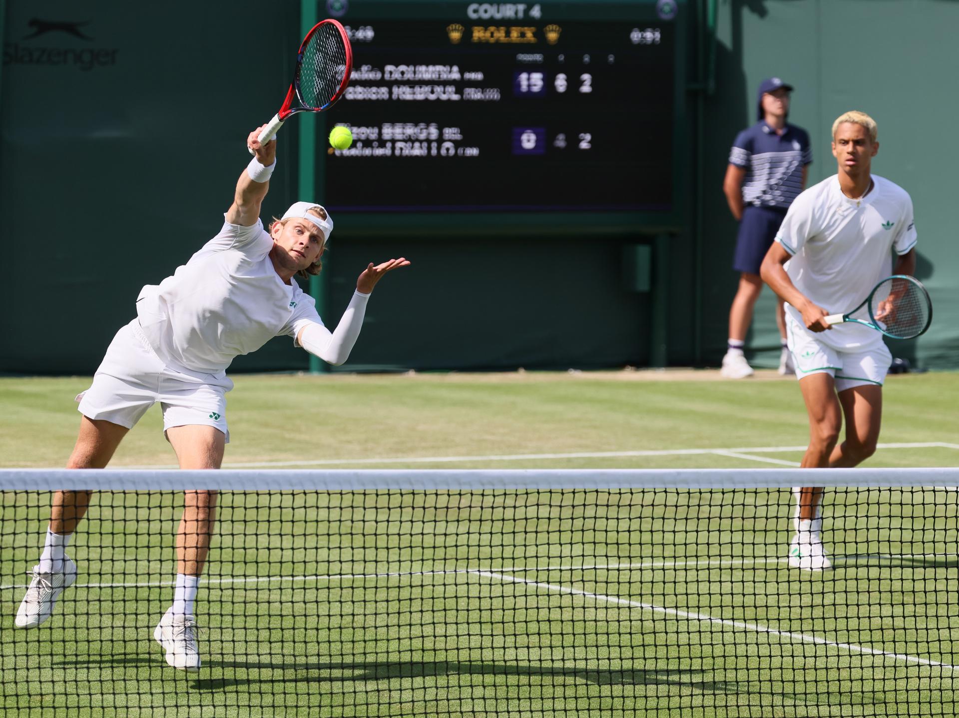 Belgian Zizou Bergs and Canadian Gabriel Diallo pictured in action during a doubles tennis match against French pair Doumbia-Reboul, in the first round of the men's doubles at the 2025 Wimbledon grand slam tournament, Thursday 03 July 2025 at the All England Tennis Club, in South-West London, Britain. BELGA PHOTO BENOIT DOPPAGNE