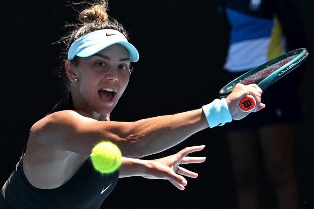 Romania's Jaqueline Cristian hits a return against Germany's Eva Lys during their women's singles match on day seven of the Australian Open tennis tournament in Melbourne on January 18, 2025.  Paul Crock / AFP