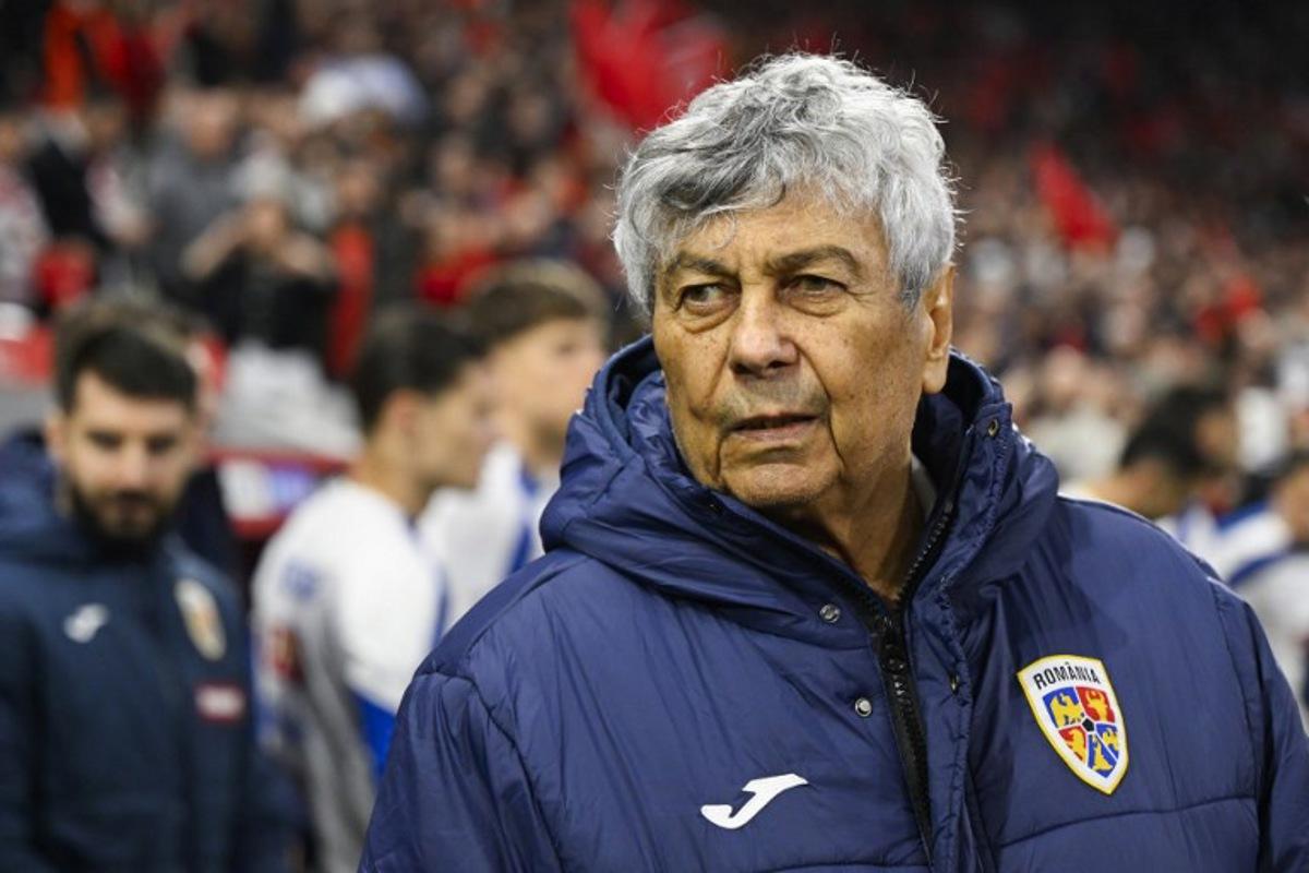 Romania's headacoach Mircea Lucescu looks on ahead of the play-off FIFA World Cup 2026 European qualification knockout semi-final football match between Turkey and Romania at Besiktas Park stadium, in Istanbul on March 26, 2026.  YASIN AKGUL / AFP