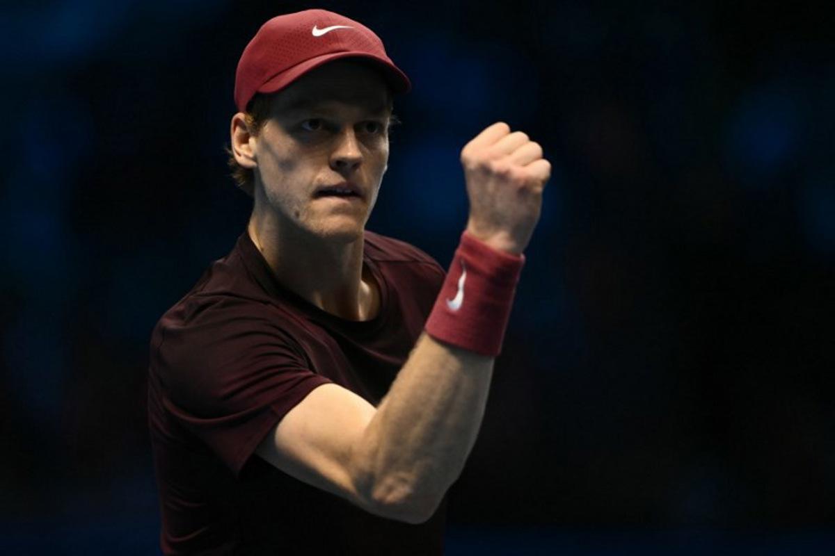Italy's Jannik Sinner reacts during his match against Germany's Alexander Zverev at the ATP Finals tennis tournament in Turin on November 12, 2025.  Marco BERTORELLO / AFP
