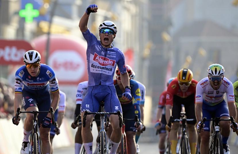 Belgian Jasper Philipsen of Alpecin-Deceuninck celebrates after winning the 'Classic Brugge-De Panne' men's elite one-day cycling race, 198,9 km from Brugge to De Panne, Wednesday 20 March 2024. BELGA PHOTO DIRK WAEM