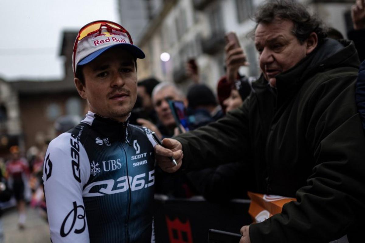 Team Q36.5's British rider Thomas Pidcock attends the teams presentation on the eve of the Milan - Sanremo one-day classic cycling race, in Pavia, near Milan, on March 21, 2025.  MARCO BERTORELLO / AFP