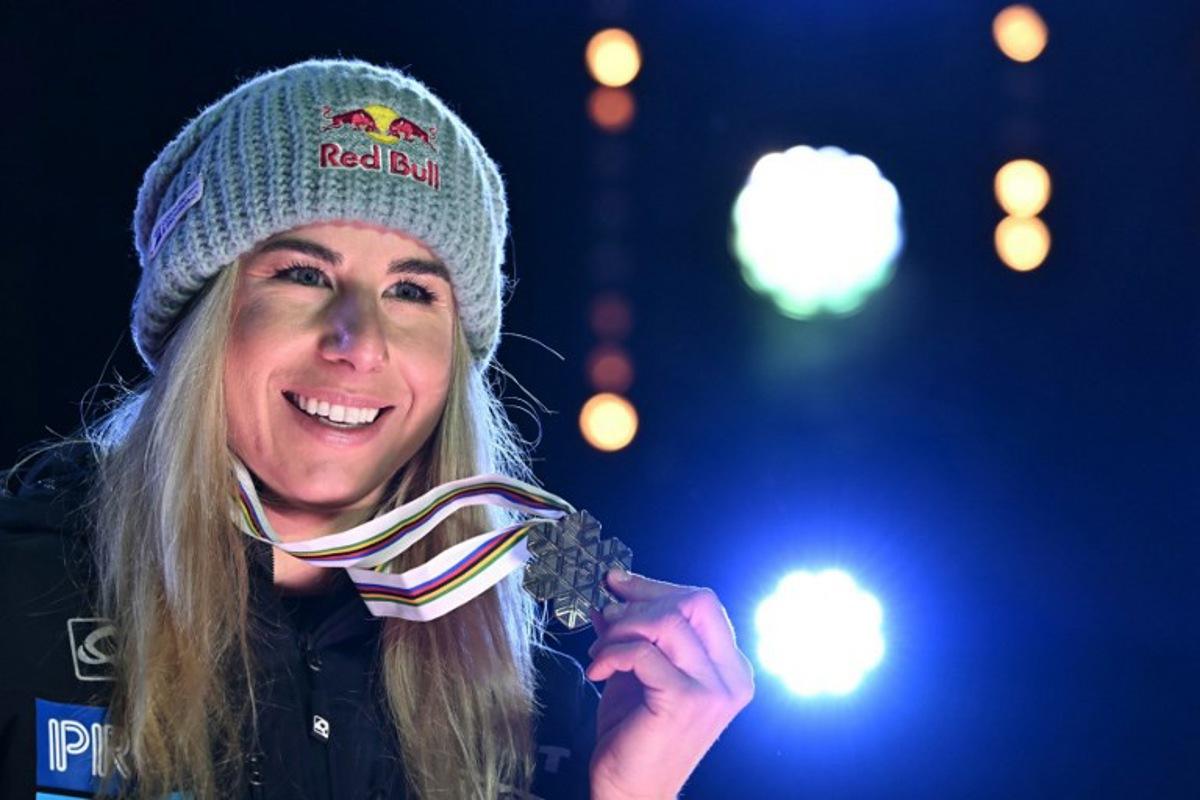 Third-placed Czech Republic's Ester Ledecka poses for pictures during the medal ceremony after the Women's Downhill event of the Saalbach 2025 FIS Alpine World Ski Championships in Hinterglemm on February 8, 2025.  Fabrice COFFRINI / AFP