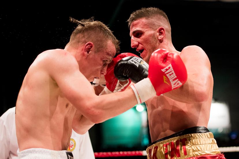 Belgian Jean-Pierre Bauwens Junior and Meriton Karaxha pictured in action during the fight between Belgian Jean-Pierre 'Junior' Bauwens and Belgian Meriton Karaxha, the super lightweight fight at the Gent Boksgala boxing event, on Friday 29 April 2016, in Ghent. BELGA PHOTO JASPER JACOBS