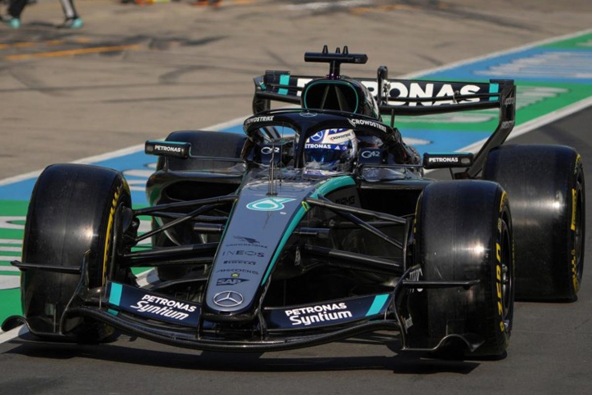 Mercedes' British driver George Russell drives in the pit lane during the sprint qualifying session ahead of the Formula One Chinese Grand Prix at the Shanghai International Circuit in Shanghai on March 13, 2026.  Andy WONG / POOL / AFP