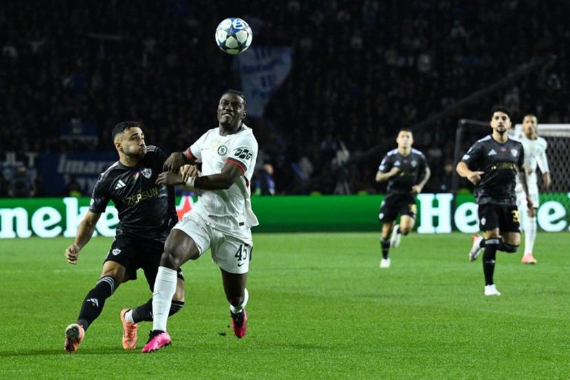Qarabag's Cape Verdean midfielder #15 Leandro Andrado and Chelsea's Belgian midfielder #45 Romeo Lavia vie for the ball during the UEFA Champions League league phase football match between Qarabag and Chelsea at the Tofiq Bahramov Republican Stadium in Baku on November 5, 2025.  Tofik BABAYEV / AFP
