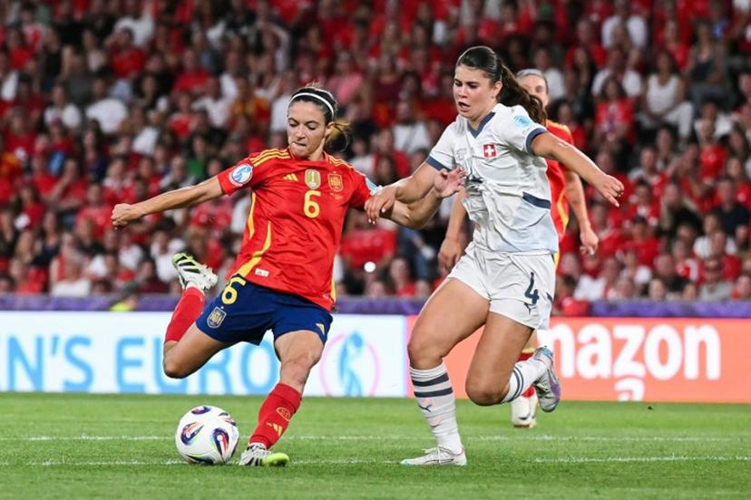 Spain's midfielder #06 Aitana Bonmati fights for the ball with Switzerland's midfielder #04 Noemi Ivelj during the UEFA Women's Euro 2025 quarter finals football match between Spain and Switzerland at the Wankdorf stadium in Bern, northwestern Switzerland on July 18, 2025.  SEBASTIEN BOZON / AFP