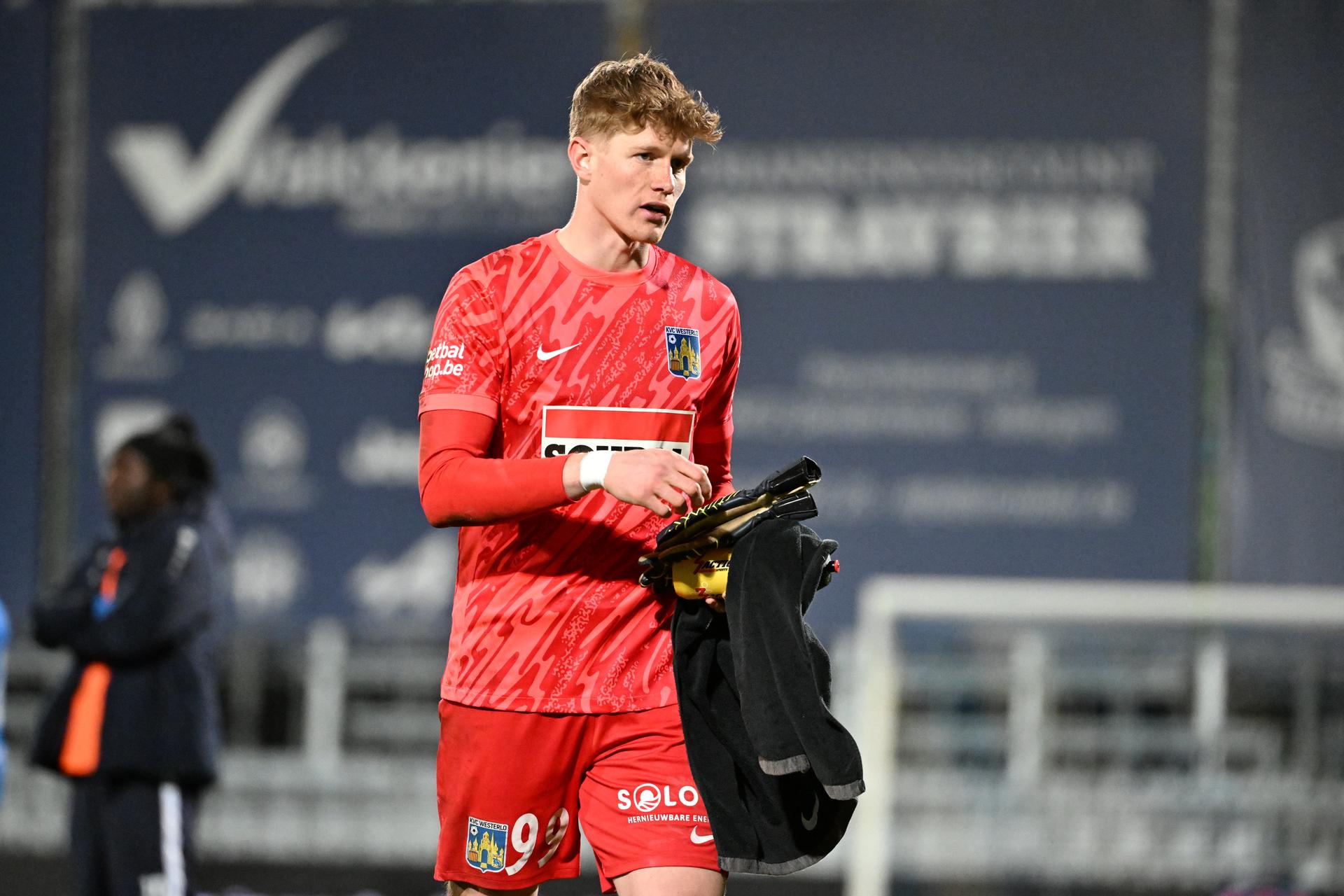 Westerlo's goalkeeper Andreas Jungdal looks dejected after a soccer match between FCV Dender EH and KVC Westerlo, Sunday 30 March 2025 in Denderleeuw, on day 1 (out of 10) of the Europe Play-offs of the 2024-2025 'Jupiler Pro League' first division of the Belgian championship. BELGA PHOTO MAARTEN STRAETEMANS