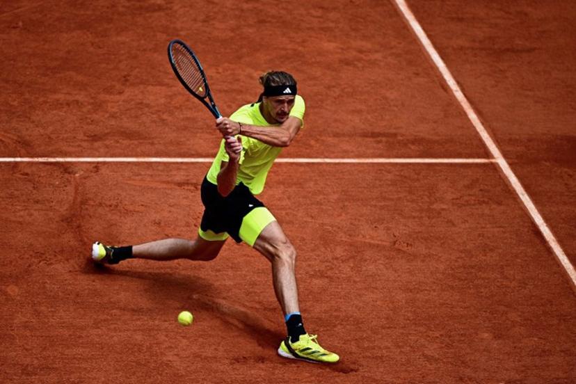 Germany's Alexander Zverev plays a backhand return to Netherlands' Tallon Griekspoor during their men's singles match on day 9 of the French Open tennis tournament on Court Suzanne-Lenglen at the Roland-Garros Complex in Paris on June 2, 2025.  JULIEN DE ROSA / AFP