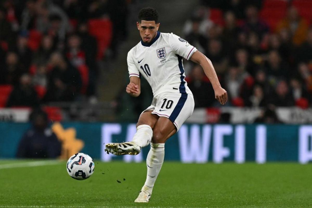 England's midfielder #10 Jude Bellingham passes the ball during the 2026 World Cup Group K qualifier football match between England and Albania, at Wembley stadium in London, on March 21, 2025.   Glyn KIRK / AFP