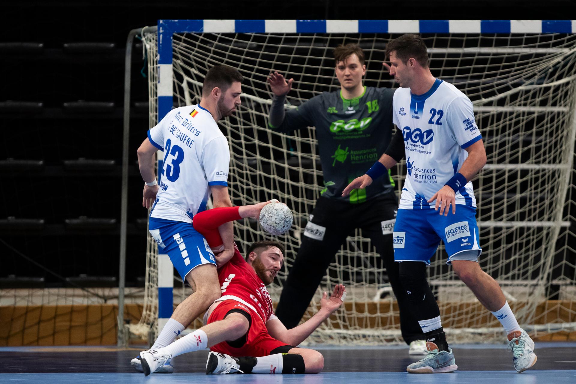 Vise's Auguste Boyon and Eupen's Jerome Majean pictured in action during a game between KTSV Eupen and HC Vise BM, Saturday 30 March 2024, in Hasselt, the men's final of the Belgian handball cup. BELGA PHOTO KRISTOF VAN ACCOM