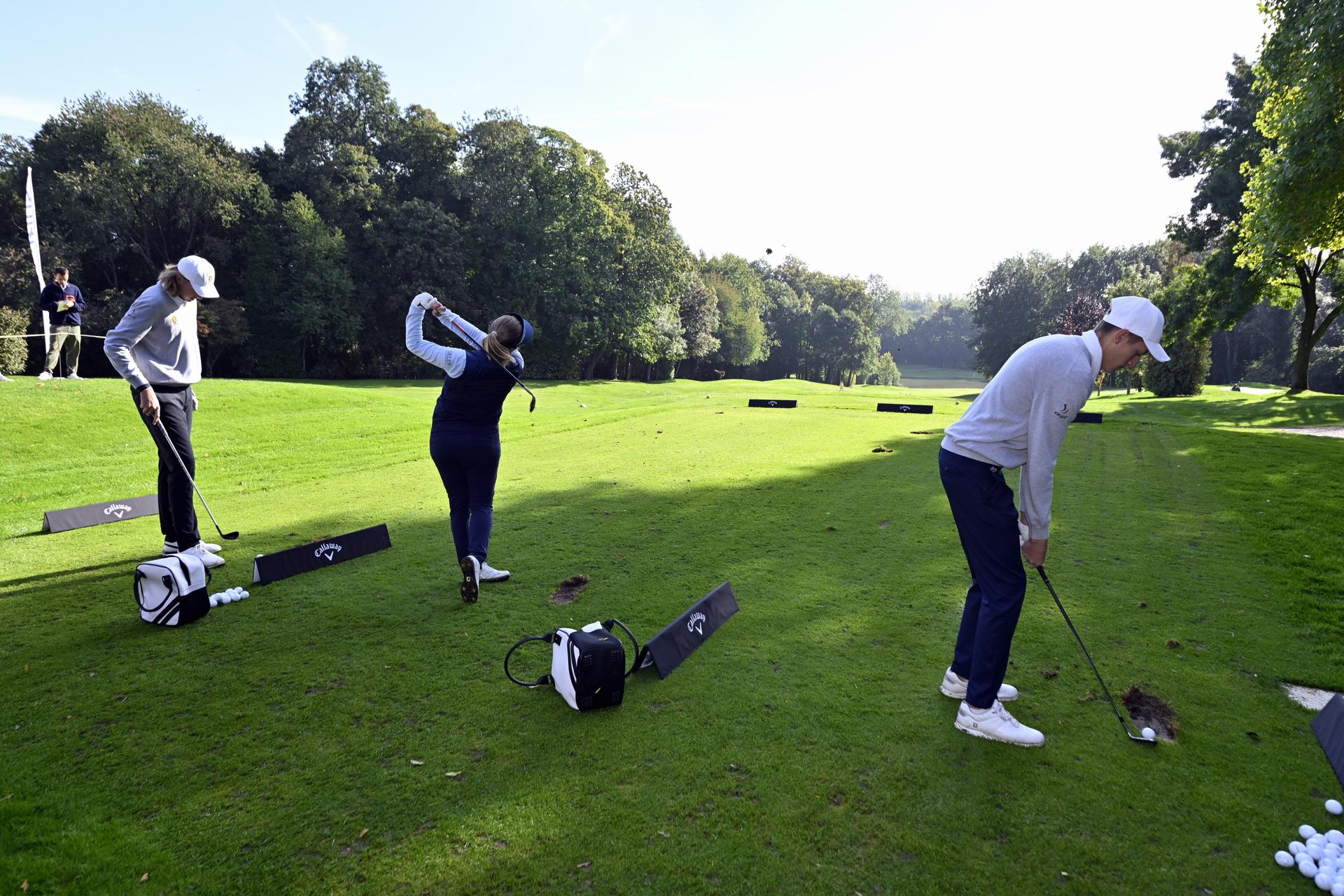 golf player Ryan Lundh, Golf player Manon De Roey and Golf Player Hugo Duquaine pictured during the 'Golf to Paris' event organised by the BOIC-COIB Belgian olympic committee, Tuesday 4 October 2022, in La Tournette golf in Nivelles. BELGA PHOTO ERIC LALMAND