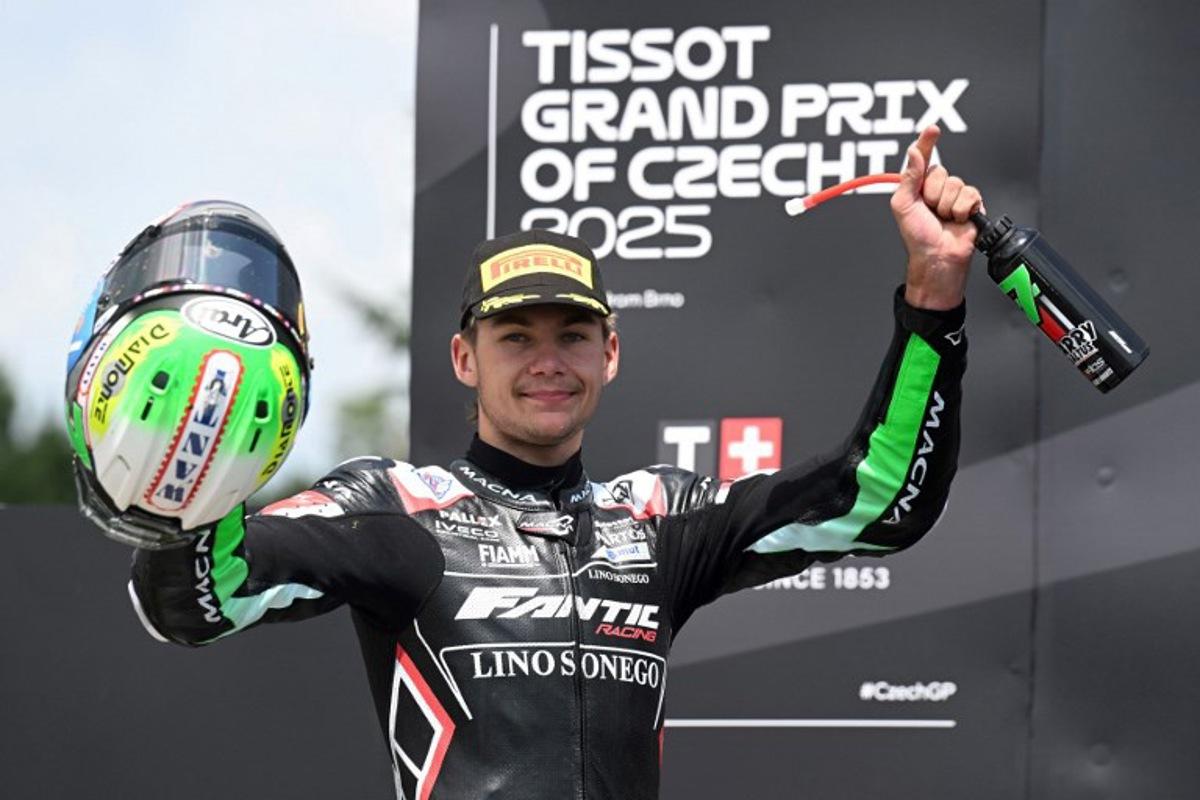 Second placed Fantic Racing Moto2 team's Belgian rider Barry Baltus celebrates on the podium after the Moto 2 Czech Grand Prix at Masaryk circuit in Brno on July 20, 2025.  Michal Cizek / AFP