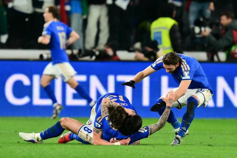 Italy's midfielder #08 Sandro Tonali, Italy's midfielder #13 Riccardo Calafiori celebrate the second goal during the play-off FIFA World Cup 2026 European qualification semi-final football match between Italy and North Ireland at the Gewiss stadium in Bergamo, on March 26, 2026.   Stefano RELLANDINI / AFP