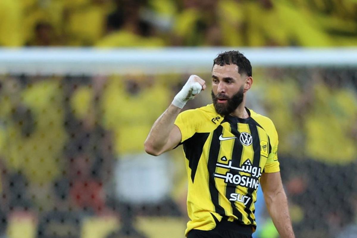 Ittihad's French forward #09 Karim Benzema reacts after scoring during the King's Cup final match between Ittihad FC and Qadsiah FC at the King Abdullah Sport City Stadium in Jeddah on May 30, 2025.  Abdel Ghani BASHIR / AFP
