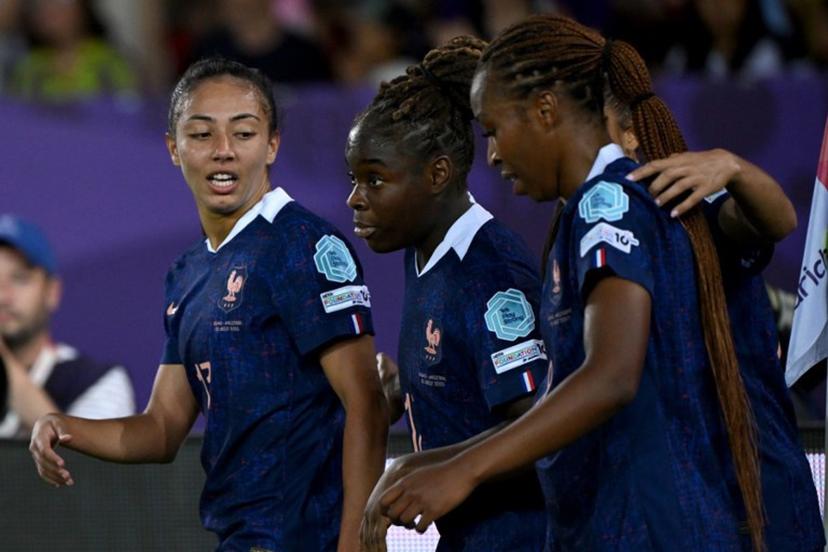 France's midfielder #17 Sandy Baltimorem (C) celebrates with teammates France's midfielder #17 Sandy Baltimore (L) and France's midfielder #08 Grace Geyoro (R) after scoring a goal during the UEFA Women's Euro 2025 Group D football match between France and England at the Letzigrund Stadium in Zurich, on July 5, 2025.   Miguel MEDINA / AFP