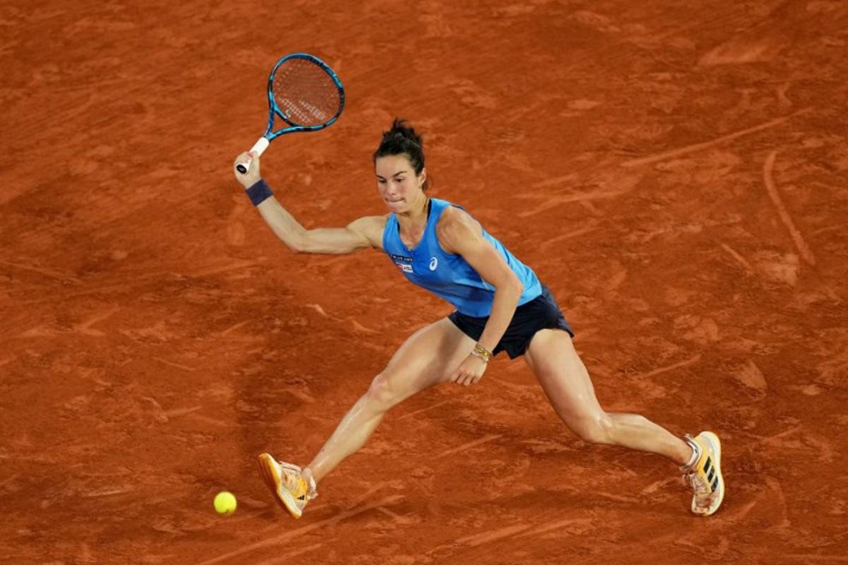 France's Lois Boisson plays a forehand return to US Coco Gauff during their women's singles semi-final match on day 12 of the French Open tennis tournament on Court Philippe-Chatrier at the Roland-Garros Complex in Paris on June 5, 2025.  Dimitar DILKOFF / AFP