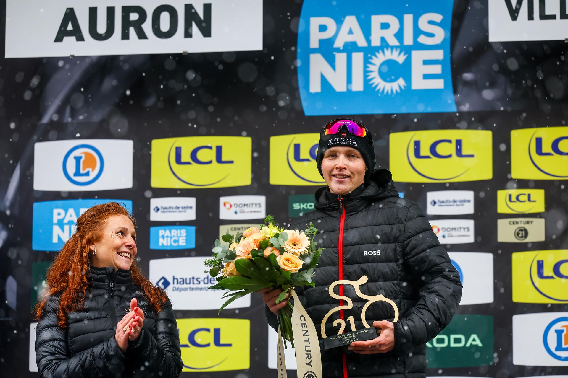 Australian Michael Storer of Tudor Pro Cycling Team celebrates on the podium after winning stage seven of the 83th edition of the Paris-Nice cycling race, 147,8 km from Nice to Auron, France, Saturday 15 March 2025. BELGA PHOTO DAVID PINTENS