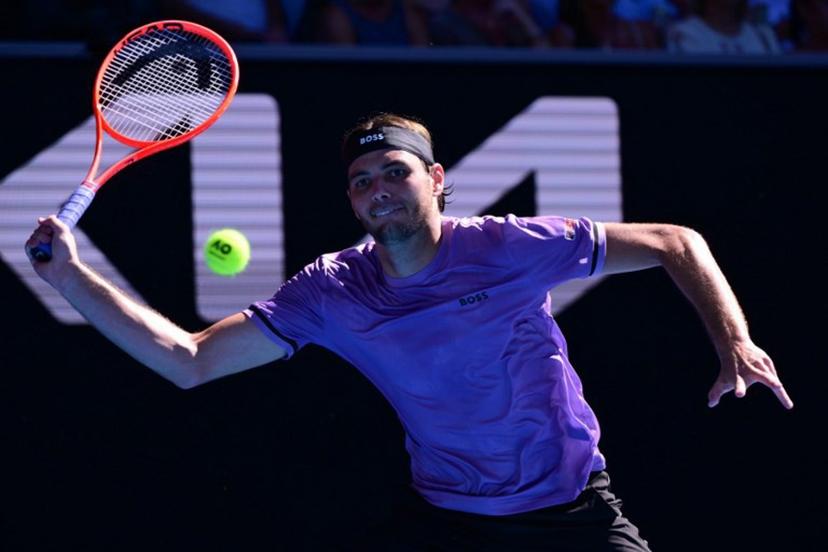 USA's Taylor Fritz hits a shot against France's Gael Monfils during their men's singles match on day seven of the Australian Open tennis tournament in Melbourne on January 18, 2025.  Yuichi YAMAZAKI / AFP