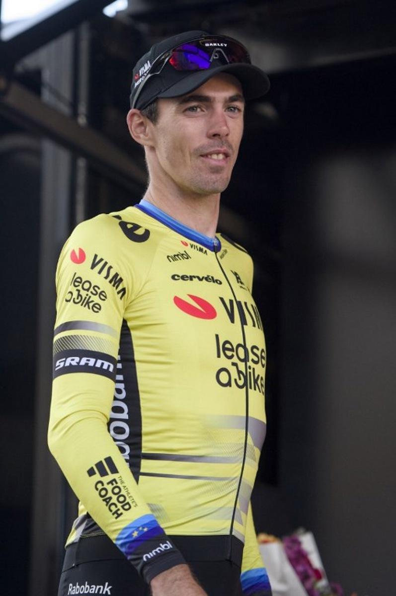 Second-placed Team Visma Lease a Bike team's French rider Christophe Laporte looks on, on the podium, after the 119th edition of the 211,6 km Paris-Tours one day cycling race, in Tours, central France on October 12, 2025.  GUILLAUME SOUVANT / AFP