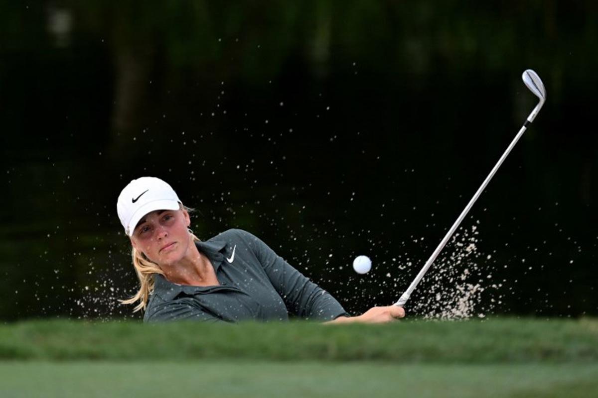 Sweden's Maja Stark watches her shot out of a bunker during the third day of the Maybank Championship golf tournament at the Kuala Lumpur Golf and Country Club in Kuala Lumpur on October 26, 2024.  Mohd RASFAN / AFP
