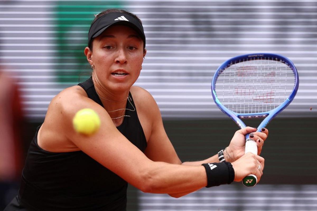 US Jessica Pegula plays a backhand return to Czech Republic's Marketa Vondrousova during their women's singles match on day 7 of the French Open tennis tournament on Court Philippe-Chatrier at the Roland-Garros Complex in Paris on May 31, 2025.  Anne-Christine POUJOULAT / AFP