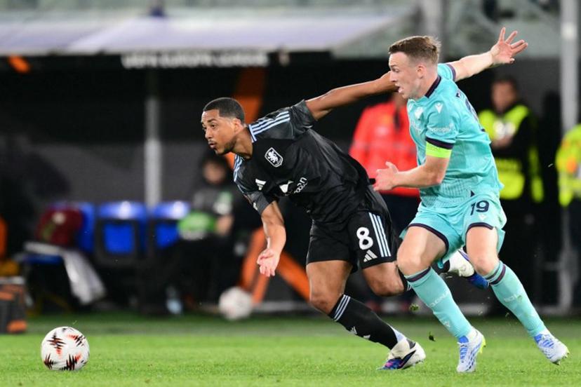 Aston Villa's Belgian midfielder  #08 Youri Tielemans fights for the ball with Bologna's Scottish midfielder #19 Lewis Ferguson during the UEFA Europa League quarter final first leg football match between Bologna and Aston Villa at the Renato Dall'Ara stadium in Bologna on April 9, 2026.  Stefano RELLANDINI / AFP