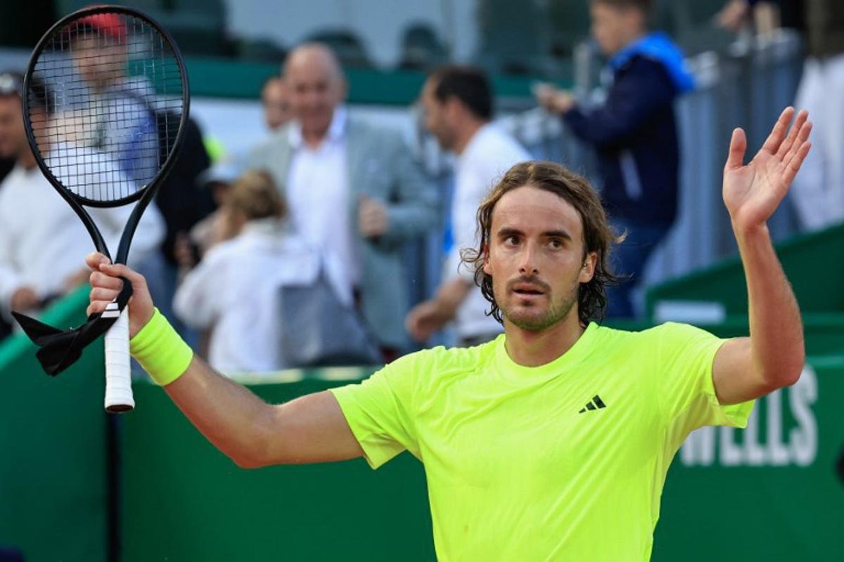 Greece's Stefanos Tsitsipas celebrates after winning against Portugal's Nuno Borges during the Monte Carlo ATP Masters Series Tournament round of 16 tennis match on the Rainier III court at the Monte Carlo Country Club in Roquebrune-Cap-Martin on April 10, 2025.  Valery HACHE / AFP
