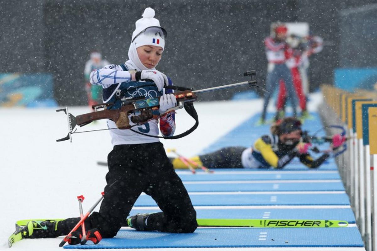France's Oceane Michelon warms up ahead of the women's biathlon 12.5km mass start event during the Milano Cortina 2026 Winter Olympic Games at the Anterselva Biathlon Arena (Sudtirol Arena) in Anterselva (Val Pusteria) on February 21, 2026.  Odd ANDERSEN / AFP