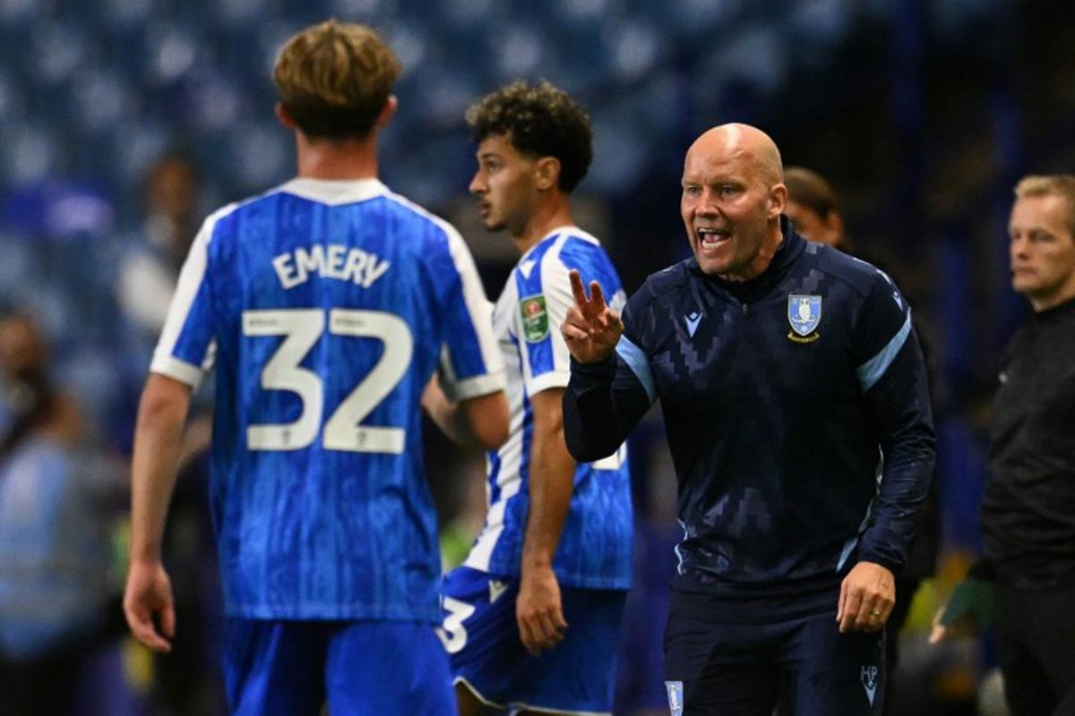 Sheffield Wednesday's Danish manager Henrik Pedersen gestures on the touchline during the English League Cup second round football match between Sheffield Wednesday and Leeds United at The Hillsborough Stadium in Sheffield, northern England on August 26, 2025.  Oli SCARFF / AFP