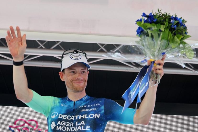 Decathlon AG2R La Mondiale's Irish rider Sam Bennett celebrates on the podium after winning the second stage of the "4 jours de Dunkerque" (Four days of Dunkirk) cycling race, 184 km from Wimereux to Abbeville, northern France, on May 15, 2024.   FRANCOIS LO PRESTI / AFP