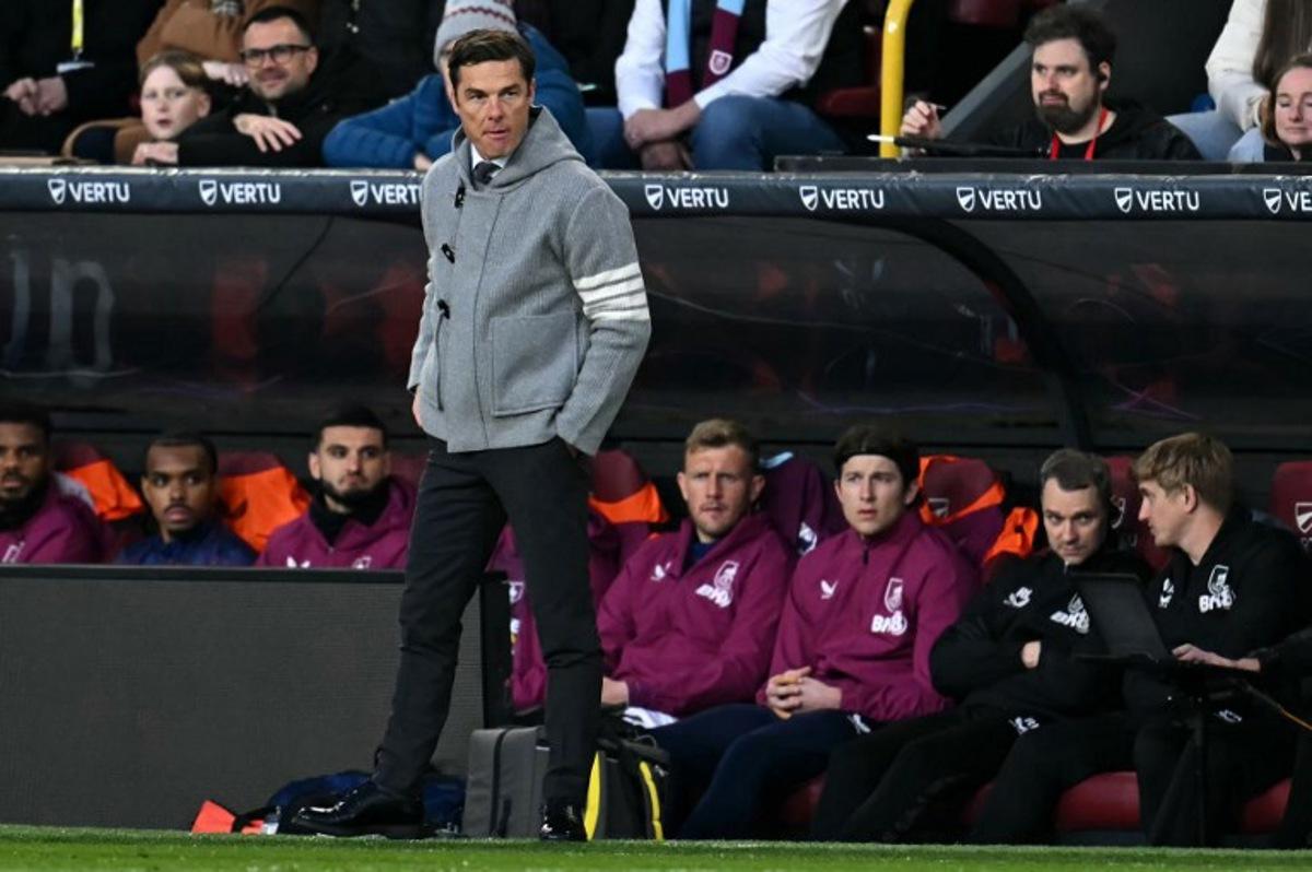 Burnley's English manager Scott Parker looks on during the English Premier League football match between Burnley and Manchester City at Turf Moor in Burnley, north-west England on April 22, 2026.  Paul ELLIS / AFP