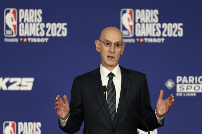 NBA commissioner Adam Silver delivers remarks during a press conference prior to the NBA basketball game between the Indiana Pacers and the San Antonio Spurs at the Accor Arena - Palais Omnisports de Paris-Bercy - in Paris on January 23, 2025.  FRANCK FIFE / AFP