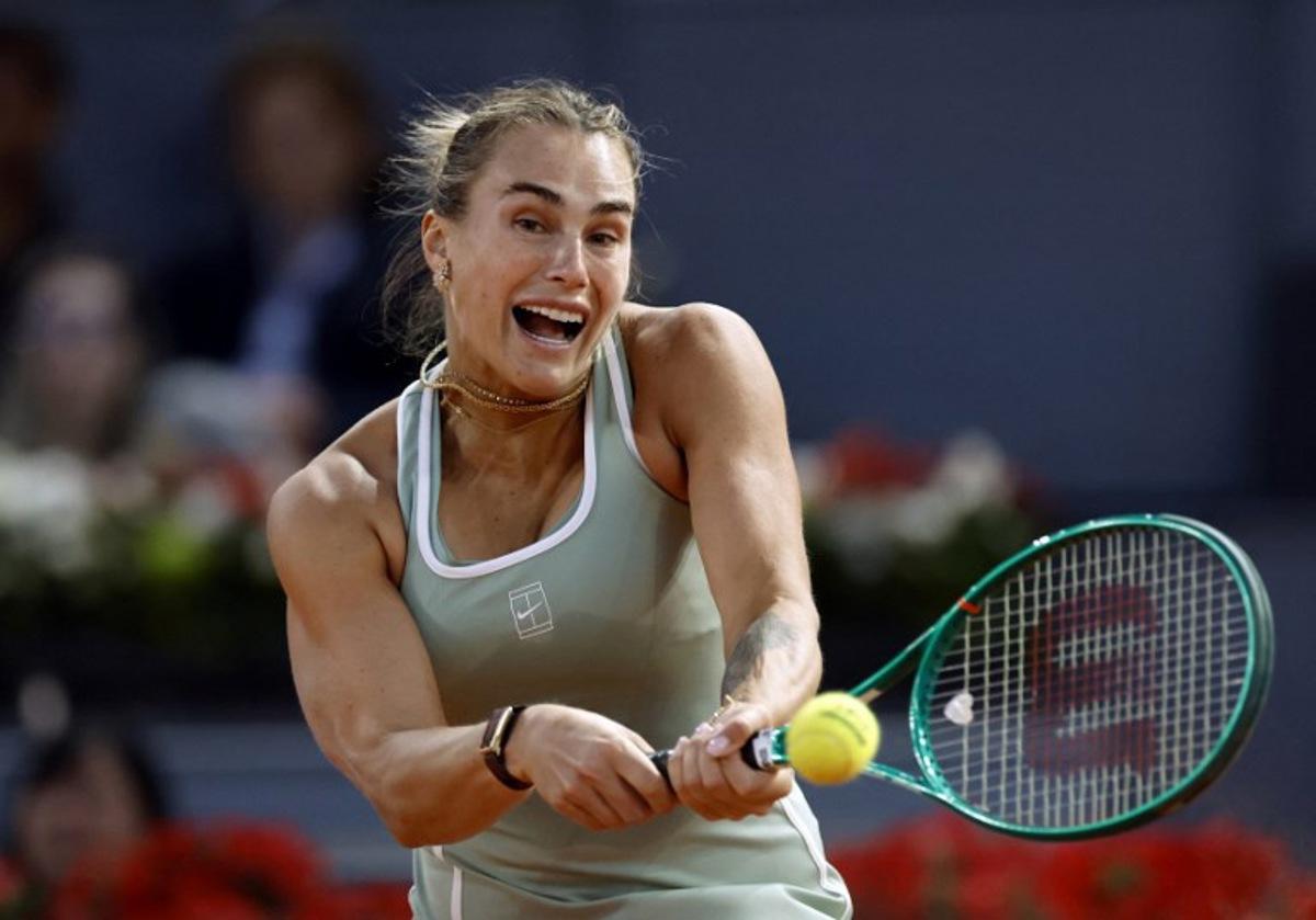 Belarus' Aryna Sabalenka returns the ball to US' Hailey Baptiste during their 2026 WTA Tour Madrid Open tennis tournament singles match at the Caja Magica in Madrid, on April 28, 2026.   OSCAR DEL POZO / AFP
