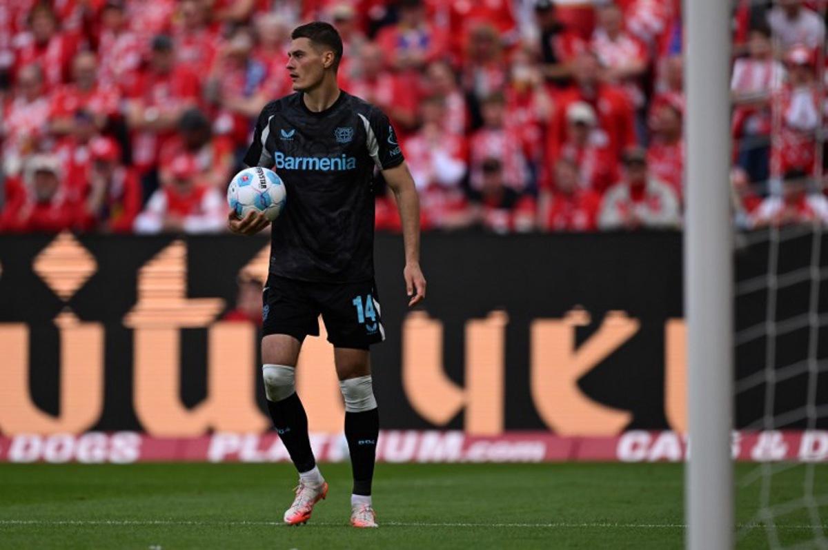 Bayer Leverkusen's Czech forward #14 Patrik Schick prepares to shoot from the penalty spot during the German first division Bundesliga football match between Mainz 05 and Bayer Leverkusen in Mainz, western Germany, on May 17, 2025.  Kirill KUDRYAVTSEV / AFP