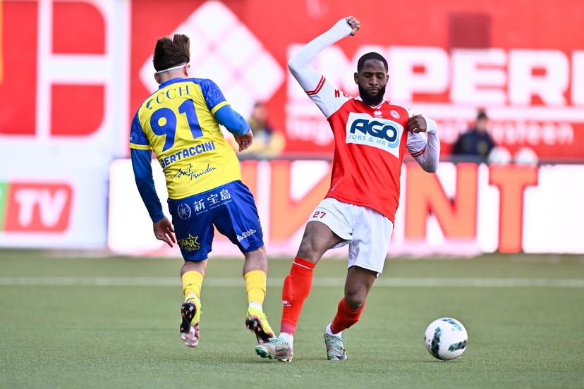 STVV's Adriano Bertaccini and Kortrijk's Abdoulaye Sissako fight for the ball during a soccer match between Sint-Truidense VV and KV Kortrijk, Sunday 06 April 2025 in Sint-Truiden, on day 2 (out of 6) of the Relegation Play-offs of the 2024-2025 'Jupiler Pro League' first division of the Belgian championship. BELGA PHOTO JOHAN EYCKENS